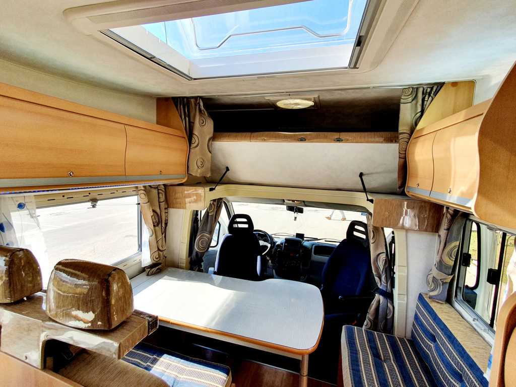 AUTOCARAVANA-ALEMANIA-DE-SEGUNDA-MANO-EN-VENTA-FUERTEVENTURA-MILANUNCIOS-OCASION-OFERTA-ELNAGH-FIAT-DUCATO-CAPUCHINA-CAMPER-CAMPERS-VAN-CARAVANA-PRECIO-CANARIAS-TENERIFE-VENTANA-CLARABOYA-PANORAMICA-ASIENTOS-GIRATORIOS-SOFA-7-PLAZAS-SOLAR